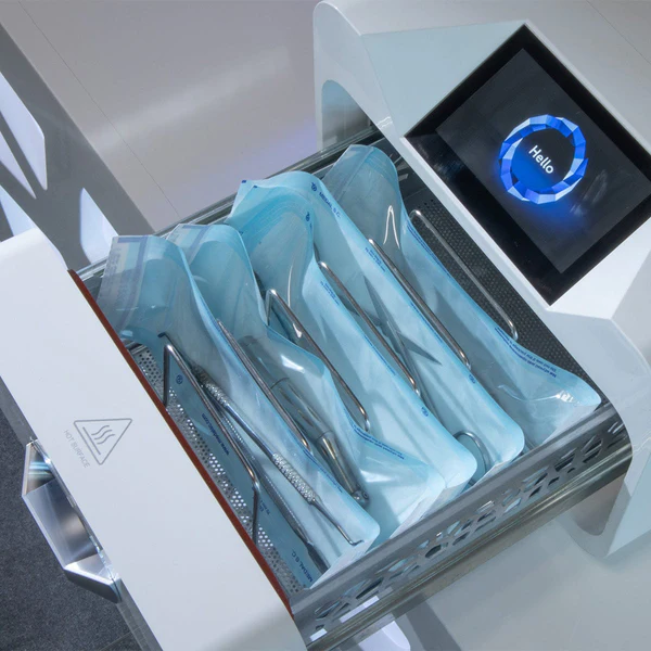 Enbio PRO autoclave with instrument sets, viewed from above